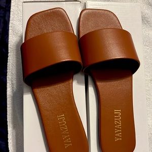Ladies flat brown slippers